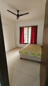 Bedroom Image of 1000 Sq.ft 2 BHK Apartment / Flat for rent in Roongta Shree Tirumala Omkar Apartment, Gangapur Nashik for Rs. 20000