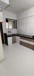 Kitchen Image of 1050 Sq.ft 2 BHK Apartment / Flat for sale in Pimple Gurav Pune for Rs. 9500000