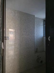 Common Bathroom Image of 650 Sq.ft 1 BHK Apartment / Flat for sale in Rajlaxmi Nakshatra Auris, Nalasopara West Nala Sopara for Rs. 4000000