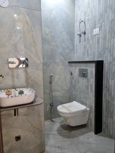 Common Bathroom One Image of 900 Sq.ft 3 BHK Apartment / Flat for sale in Dwarka Mor New Delhi for Rs. 5000000