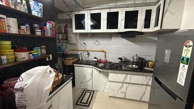 Kitchen Image of 900 Sq.ft 1.5 BHK Apartment / Flat for rent in Savvy Studioz, Gota Ahmedabad for Rs. 27000