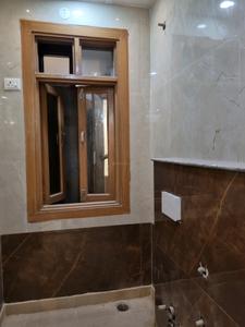 Common Bathroom Image of 675 Sq.ft 2 BHK Apartment / Flat for sale in Dwarka Mor New Delhi for Rs. 6500000