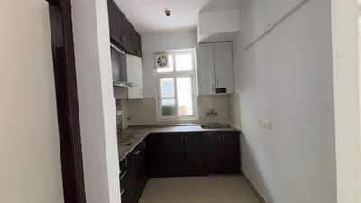 Kitchen Image of 1080 Sq.ft 2 BHK Apartment / Flat for sale in AFOWO Raksha Addela, Noida Extension Greater Noida for Rs. 8200000