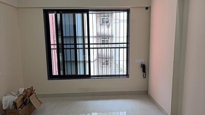 Living Room Image of 600 Sq.ft 1 BHK Apartment / Flat for sale in Modispaces Valley View, Borivali West Mumbai for Rs. 12800000