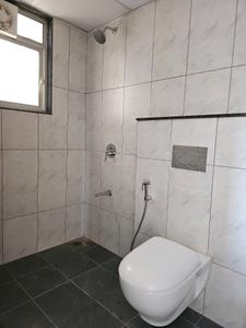Common Bathroom Image of 1050 Sq.ft 2 BHK Apartment / Flat for sale in Geras Planet Of Joy, Upper Kharadi Pune for Rs. 13000000
