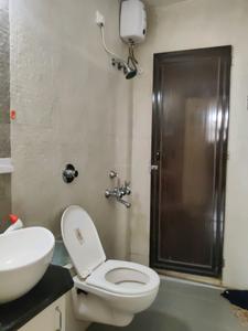 Common Bathroom Image of 800 Sq.ft 2 BHK Apartment / Flat for sale in Crystal Fiama NX, Kasarvadavali Thane for Rs. 6400000