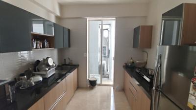 Kitchen Image of 1000 Sq.ft 2 BHK Apartment / Flat for rent in Ekta Tripolis, Goregaon West Mumbai for Rs. 85000