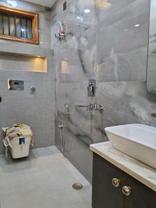Common Bathroom One Image of 1300 Sq.ft 4 BHK Apartment / Flat for sale in Dwarka Mor New Delhi for Rs. 12000000