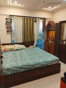 Bedroom Image of 1350 Sq.ft 3 BHK Apartment / Flat for sale in Krisna Nirmaan Amorapolis, Dhanori Pune for Rs. 9900000