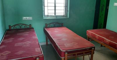 Bedroom Image of Golden nest Boys pg in Padur, Chennai