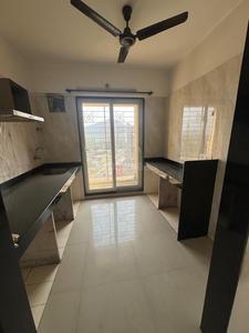 Kitchen Image of 750 Sq.ft 1 BHK Apartment / Flat for sale in Arihant Aarohi, Shilphata Thane for Rs. 4100000