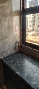 Kitchen Image of 525 Sq.ft 2 BHK Apartment / Flat for rent in Omkar Swarnim Paradise, Vavol Gandhinagar for Rs. 22000