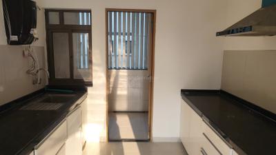 Kitchen Image of 1040 Sq.ft 2 BHK Apartment / Flat for sale in Skyi Songbirds , Bhugaon Pune for Rs. 7800000