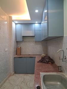 Kitchen Image of 910 Sq.ft 2 BHK Builder Floor for sale in Ramesh Nagar New Delhi for Rs. 11000000