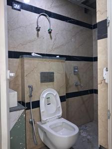 Common Bathroom Image of 1200 Sq.ft 3 BHK Apartment / Flat for sale in Hark Sai Homes 6, Sector 49 Noida for Rs. 6000000