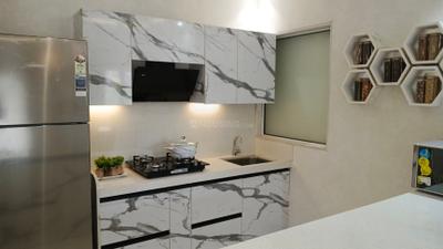 Kitchen Image of 596 Sq.ft 2 BHK Apartment / Flat for sale in Raunak Centrum, Chembur Mumbai for Rs. 19100000