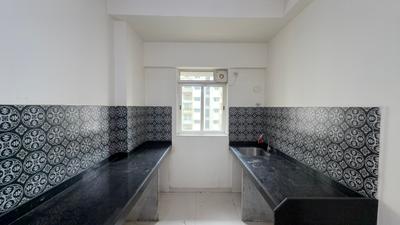 Kitchen Image of 616 Sq.ft 1 BHK Apartment / Flat for sale in Lodha Amara, Kolshet Thane for Rs. 7600000