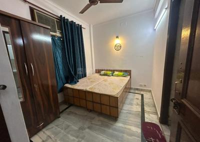 Bedroom Image of 600 Sq.ft 1 BHK Builder Floor for rent in Khirki Extension New Delhi for Rs. 18000