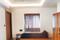 Bedroom Image of HelloWorld Houston in Vastrapur, Ahmedabad