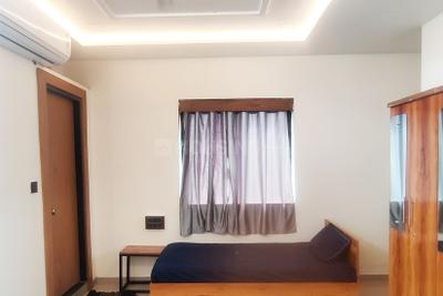 Bedroom Image of HelloWorld Houston in Vastrapur, Ahmedabad