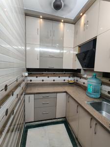 Kitchen Image of 950 Sq.ft 2 BHK Builder Floor for rent in Ramesh Nagar New Delhi for Rs. 24500