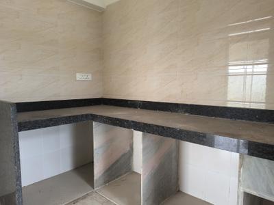 Kitchen Image of 900 Sq.ft 2 BHK Apartment / Flat for sale in Bhagwati Belmont, Kasarvadavali Thane for Rs. 9500000