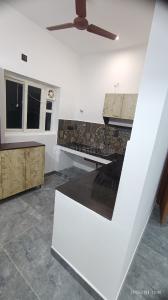 Kitchen Image of 927 Sq.ft 2 BHK Apartment / Flat for sale in Abhimanyu Chellapas, Kanathur Reddikuppam Chennai for Rs. 8500000