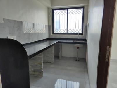 Kitchen Image of 550 Sq.ft 1.5 BHK Apartment / Flat for rent in Earth Vintage, Dadar West Mumbai for Rs. 60000