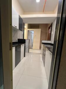 Kitchen Image of 730 Sq.ft 1 BHK Apartment / Flat for sale in Mohan Precious Greens, Ambernath East Ambernath for Rs. 3500000