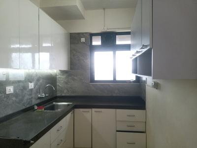 Kitchen Image of 955 Sq.ft 2 BHK Apartment / Flat for sale in Raj Exotica, Mira Road East Mira Bhayandar for Rs. 11200000