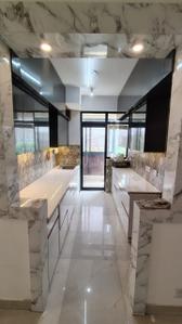 Kitchen Image of 1295 Sq.ft 2 BHK Apartment / Flat for rent in Paramount Symphony, Crossings Republik Ghaziabad for Rs. 17500
