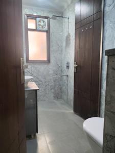 Common Bathroom Image of 1800 Sq.ft 4 BHK Builder Floor for sale in Freedom Fighters Enclave New Delhi for Rs. 18000000