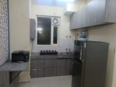 Kitchen Image of 850 Sq.ft 2 BHK Apartment / Flat for rent in Pyramid Fusion Homes, Sector 70A Gurgaon for Rs. 34000