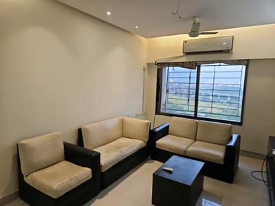 Living Room Image of 950 Sq.ft 2 BHK Apartment / Flat for rent in Ajmera Bhakti Park, Wadala East Mumbai for Rs. 72000