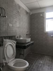 Common Bathroom Image of 1050 Sq.ft 2 BHK Apartment / Flat for sale in Shri Radha Aqua Garden, Noida Extension Greater Noida for Rs. 8600000