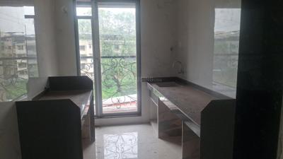 Kitchen Image of 1250 Sq.ft 3 BHK Apartment / Flat for sale in Adimaya Adishakti, Dombivli East Thane for Rs. 14500000