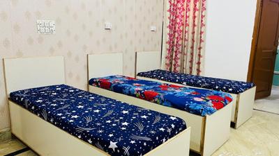 Bedroom Image of SHUBHAM BOYS HOSTEL AND PG in Beta I, Greater Noida