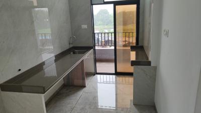 Kitchen Image of 710 Sq.ft 1 BHK Apartment / Flat for sale in Shilphata Thane for Rs. 4250000