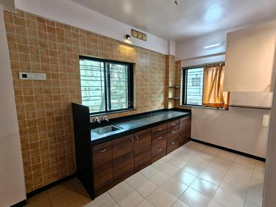 Kitchen Image of 850 Sq.ft 1.5 BHK Apartment / Flat for rent in Dhankawadi Pune for Rs. 20000