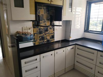 Kitchen Image of 816 Sq.ft 2 BHK Apartment / Flat for rent in Andheri East Mumbai for Rs. 80000