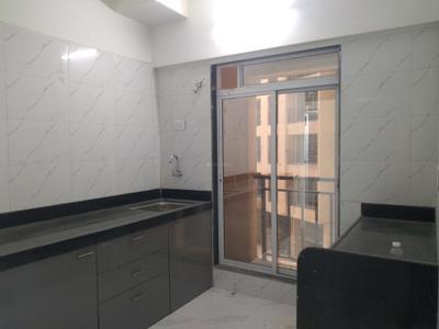 Kitchen Image of 705 Sq.ft 1 BHK Apartment / Flat for sale in Munish Emonics Tower, Vasai East Vasai for Rs. 3877000