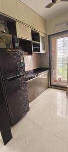 Kitchen Image of 800 Sq.ft 2 BHK Apartment / Flat for sale in Arihant Aarohi, Shilphata Thane for Rs. 7000000