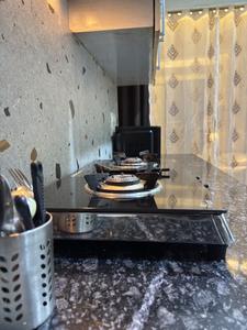 Kitchen Image of 400 Sq.ft 1 BHK Studio for rent in DLF Capital Greens Phase 1 And 2, Karampura New Delhi for Rs. 25000