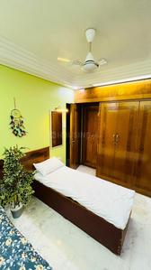 Bedroom Image of COMFORT PG in Malad West, Mumbai