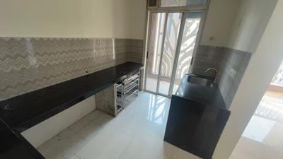 Kitchen Image of 850 Sq.ft 2 BHK Apartment / Flat for sale in Bhiwandi Thane for Rs. 6999999
