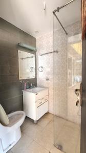 Bathroom Image of 160 Sq.ft 1 RK Builder Floor for rent in Defence Colony New Delhi for Rs. 65000