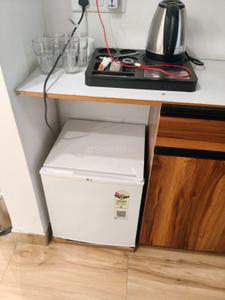 Kitchen Image of 650 Sq.ft 1 RK Apartment / Flat for rent in Godrej The Suites, Jaypee Greens Greater Noida for Rs. 29000