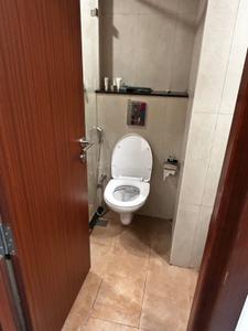 Bathroom Image of 500 Sq.ft 1 RK Apartment / Flat for rent in L And T Raintree Boulevard, Sahakara Nagar Bengaluru for Rs. 40000