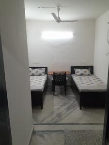 Bedroom Image of Adya pg in Sector 19, Noida