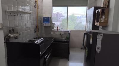 Kitchen Image of 666 Sq.ft 1 BHK Apartment / Flat for rent in Kalp Capitol Flora And Capitol Icon 2, Sargasan Gandhinagar for Rs. 20000